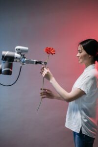 a robot holding a flower